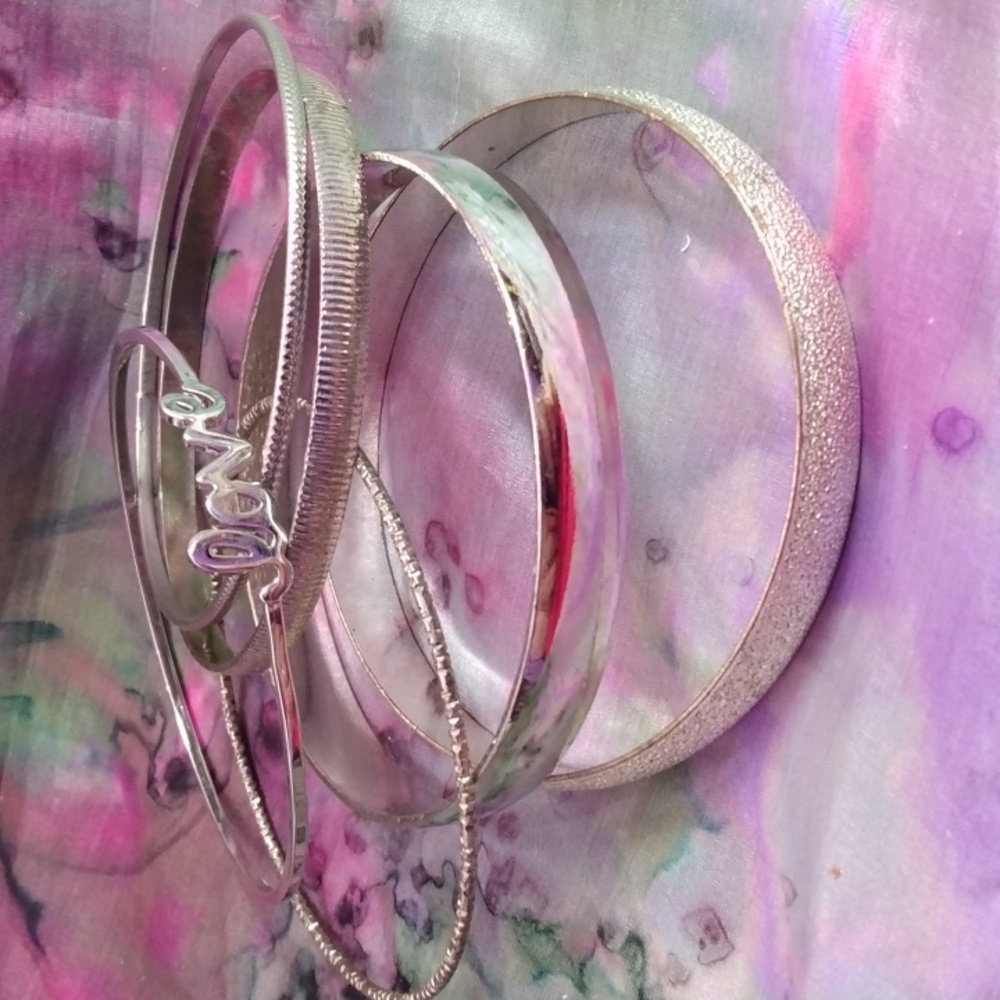 Lot of silver tone bangle bracelets